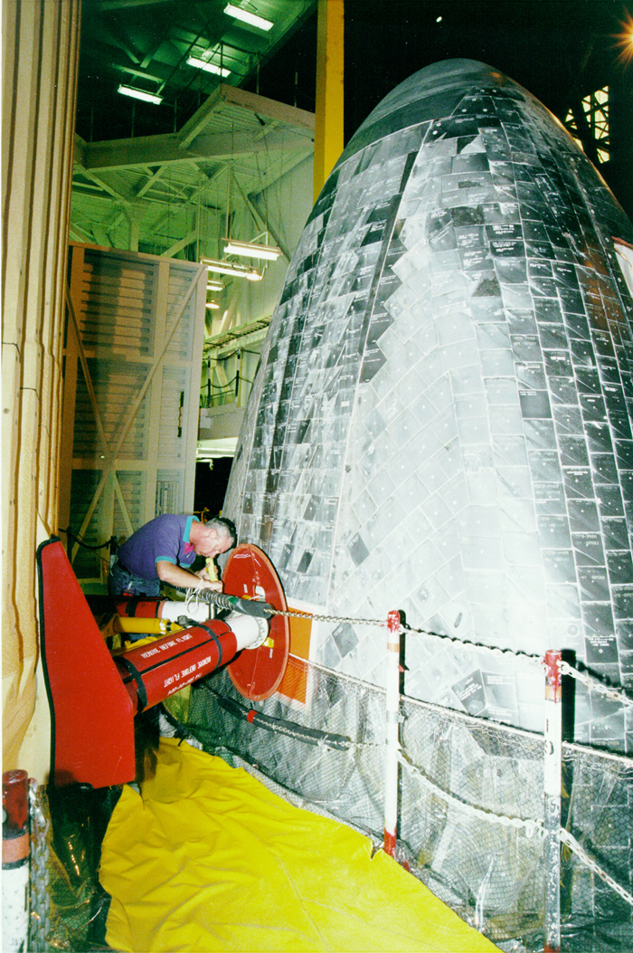 Space History Photo: Discovery External Tank Connection Check